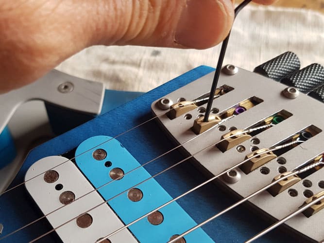 Reglage hauteur pontet chevalet headless