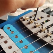 Reglage hauteur pontet chevalet headless